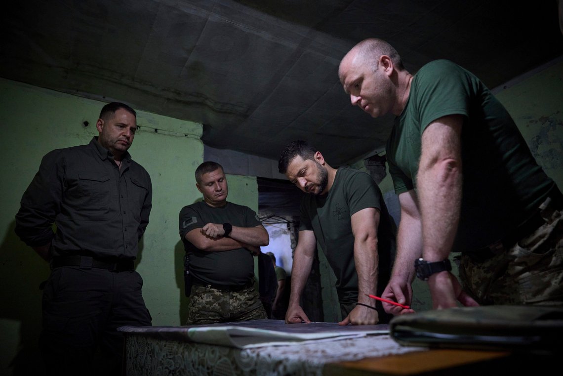 In this photo provided by the Ukrainian Presidential Press Office, Ukrainian President Volodymyr Zelenskyy during his visit to the headquarters of brigades at the front line near Soledar, Donetsk region, Ukraine, Monday, Aug. 14, 2023. (Ukrainian Presidential Press Office via AP) In this photo provided by the Ukrainian Presidential Press Office, Ukrainian President Volodymyr Zelenskyy during his visit to the headquarters of brigades at the front line near Soledar, Donetsk region, Ukraine, Monday, Aug. 14, 2023. (Ukrainian Presidential Press Office via AP)
