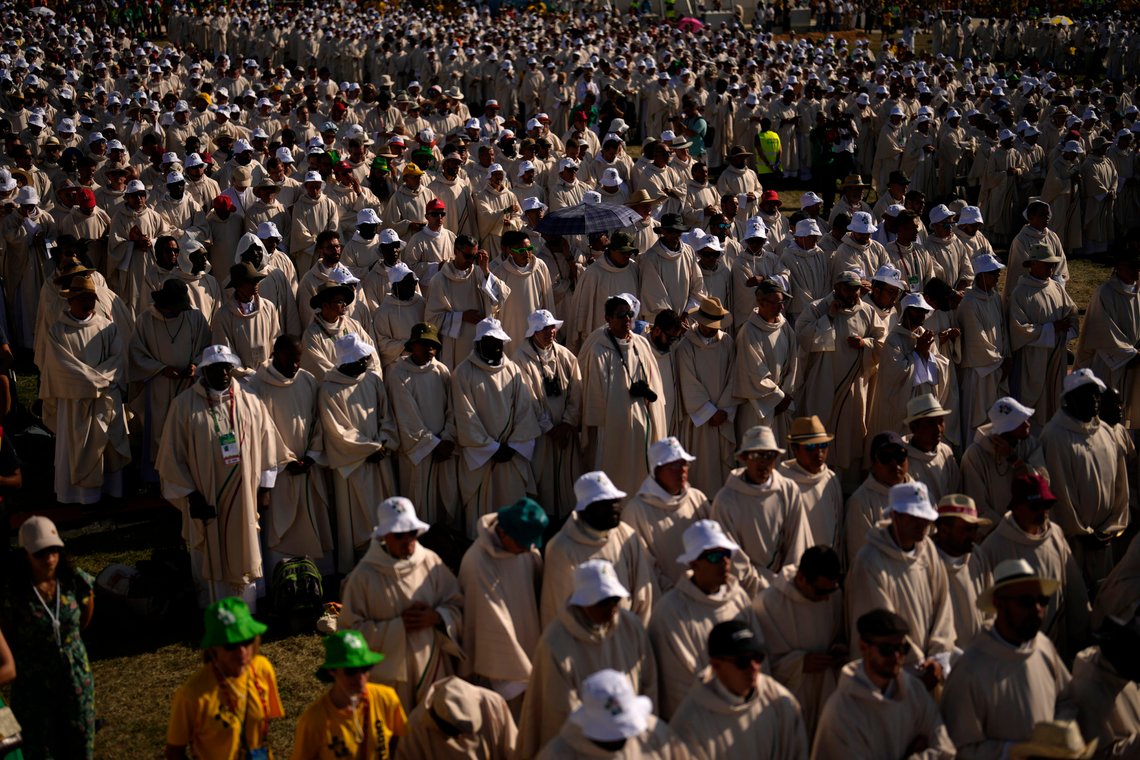 Pilgrims attend a mass presided by the Pope Francis at the Parque Tejo in Lisbon celebrating the 37th World Youth Day on Sunday, Aug. 6, 2023. An estimated 1.5 million young people filled the parque on Saturday for Pope Francis' World Youth Day vigil, braving scorching heat to secure a spot for the evening prayer and to camp out overnight for his final farewell Mass on Sunday morning. (AP Photo/Francisco Seco) Pilgrims attend a mass presided by the Pope Francis at the Parque Tejo in Lisbon celebrating the 37th World Youth Day on Sunday, Aug. 6, 2023. An estimated 1.5 million young people filled the parque on Saturday for Pope Francis' World Youth Day vigil, braving scorching heat to secure a spot for the evening prayer and to camp out overnight for his final farewell Mass on Sunday morning. (AP Photo/Francisco Seco)