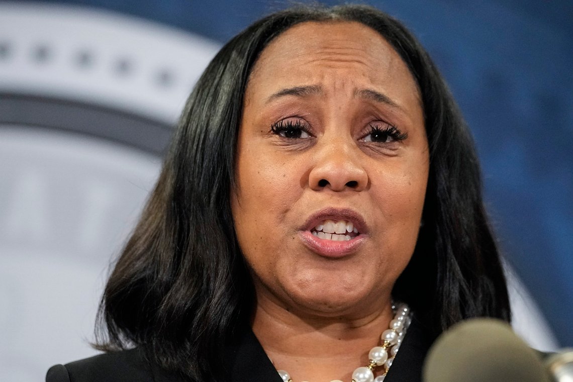 Fulton County District Attorney Fani Willis speaks in the Fulton County Government Center during a news conference, Monday, Aug. 14, 2023, in Atlanta. Donald Trump and several allies have been indicted in Georgia over efforts to overturn his 2020 election loss in the state. (AP Photo/John Bazemore) Fulton County District Attorney Fani Willis speaks in the Fulton County Government Center during a news conference, Monday, Aug. 14, 2023, in Atlanta. Donald Trump and several allies have been indicted in Georgia over efforts to overturn his 2020 election loss in the state. (AP Photo/John Bazemore)