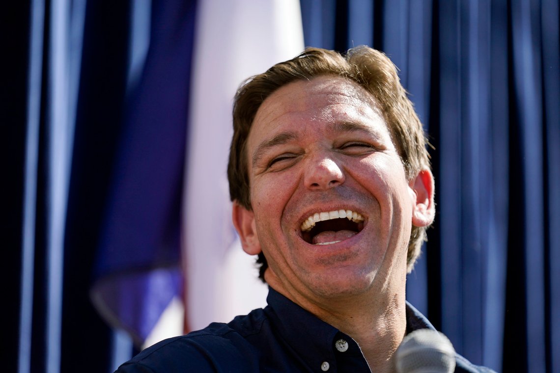 Republican presidential candidate Florida Gov. Ron DeSantis laughs during a Fair-Side Chat with Iowa Gov. Kim Reynolds at the Iowa State Fair, Saturday, Aug. 12, 2023, in Des Moines, Iowa. (AP Photo/Jeff Roberson) Republican presidential candidate Florida Gov. Ron DeSantis laughs during a Fair-Side Chat with Iowa Gov. Kim Reynolds at the Iowa State Fair, Saturday, Aug. 12, 2023, in Des Moines, Iowa. (AP Photo/Jeff Roberson)