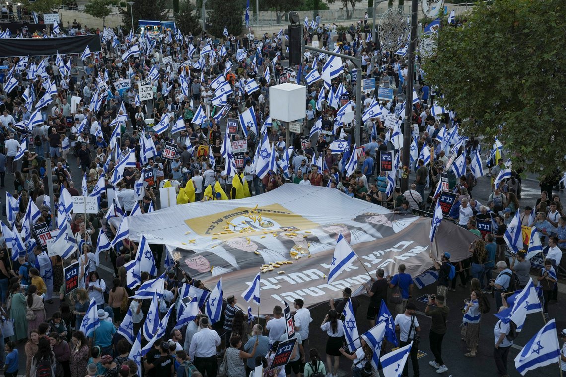 Israelis support plans by Prime Minister Benjamin Netanyahu's government to overhaul the judicial system protest against Israel's Supreme Court in Jerusalem, Thursday, Sept. 7, 2023. Thousands supporting the Israeli government's judicial overhaul rallied in front of the Supreme Court Thursday, ahead of a pivotal hearing next week on the legality of the first major bill of the overhaul. (AP Photo/Mahmoud Illean) Israelis support plans by Prime Minister Benjamin Netanyahu's government to overhaul the judicial system protest against Israel's Supreme Court in Jerusalem, Thursday, Sept. 7, 2023. Thousands supporting the Israeli government's judicial overhaul rallied in front of the Supreme Court Thursday, ahead of a pivotal hearing next week on the legality of the first major bill of the overhaul. (AP Photo/Mahmoud Illean)
