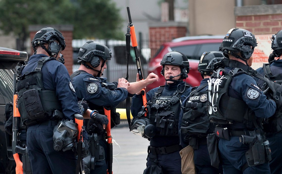 The St. Louis police SWAT team gathers in front of the city jail in downtown St. Louis, known as the City Justice Center, after a guard was reportedly taken hostage on Tuesday, Aug. 22, 2023. (Robert Cohen/St. Louis Post-Dispatch via AP) The St. Louis police SWAT team gathers in front of the city jail in downtown St. Louis, known as the City Justice Center, after a guard was reportedly taken hostage on Tuesday, Aug. 22, 2023. (Robert Cohen/St. Louis Post-Dispatch via AP)