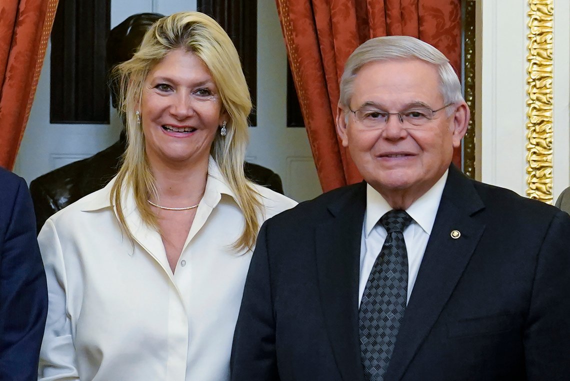 FILE - Senate Foreign Relations Committee Chairman, Sen. Bob Menendez, D-N.J., right, and his wife Nadine Arslanian, pose for a photo on Capitol Hill in Washington, Dec. 20, 2022. U.S. Sen. Bob Menendez of New Jersey and his wife have been indicted on charges of bribery. Federal prosecutors on Friday announced the charges against the 69-year-old Democrat nearly six years after an earlier criminal case against him ended with a deadlocked jury. (AP Photo/Susan Walsh, File) FILE - Senate Foreign Relations Committee Chairman, Sen. Bob Menendez, D-N.J., right, and his wife Nadine Arslanian, pose for a photo on Capitol Hill in Washington, Dec. 20, 2022. U.S. Sen. Bob Menendez of New Jersey and his wife have been indicted on charges of bribery. Federal prosecutors on Friday announced the charges against the 69-year-old Democrat nearly six years after an earlier criminal case against him ended with a deadlocked jury. (AP Photo/Susan Walsh, File)