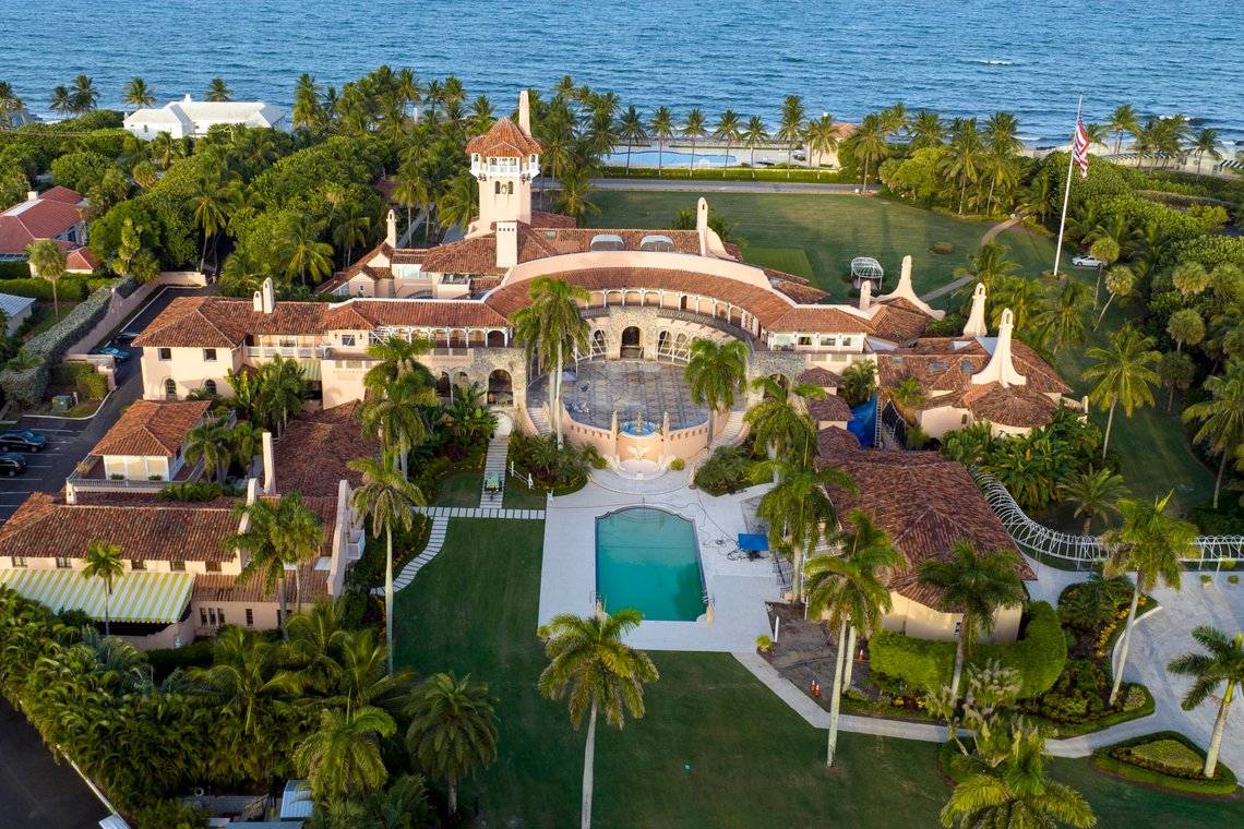 FILE - An aerial view of former President Donald Trump's Mar-a-Lago estate is seen Aug. 10, 2022, in Palm Beach, Fla. New York Judge Arthur Engoron, ruling in a civil lawsuit brought by New York Attorney General Letitia James, found that Trump and his company deceived banks, insurers and others by massively overvaluing his assets and exaggerating his net worth on paperwork used in making deals and securing loans. (AP Photo/Steve Helber, File) FILE - An aerial view of former President Donald Trump's Mar-a-Lago estate is seen Aug. 10, 2022, in Palm Beach, Fla. New York Judge Arthur Engoron, ruling in a civil lawsuit brought by New York Attorney General Letitia James, found that Trump and his company deceived banks, insurers and others by massively overvaluing his assets and exaggerating his net worth on paperwork used in making deals and securing loans. (AP Photo/Steve Helber, File)