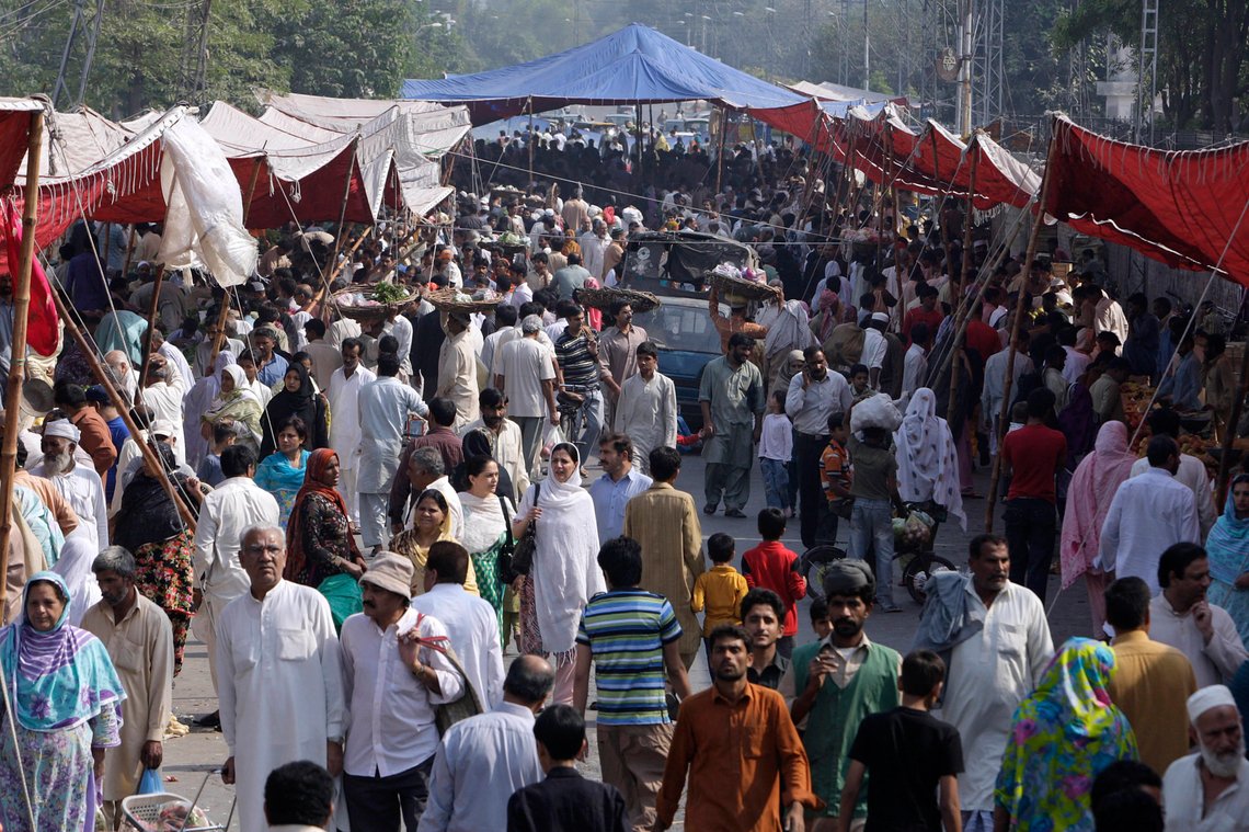 People visit a crowded weekly bazaar in Lahore, Pakistan on Sunday, Oct. 30, 2011. As of Oct. 31, according to the U.N. Population Fund, there will be 7 billion people sharing Earth's land and resources. Experts say most of Africa _ and other high-growth developing nations such as Afghanistan and Pakistan _ will be hard-pressed to furnish enough food, water and jobs for their people, especially without major new family-planning initiatives. (AP Photo/K.M. Chaudary) People visit a crowded weekly bazaar in Lahore, Pakistan on Sunday, Oct. 30, 2011. As of Oct. 31, according to the U.N. Population Fund, there will be 7 billion people sharing Earth's land and resources. Experts say most of Africa _ and other high-growth developing nations such as Afghanistan and Pakistan _ will be hard-pressed to furnish enough food, water and jobs for their people, especially without major new family-planning initiatives. (AP Photo/K.M. Chaudary)
