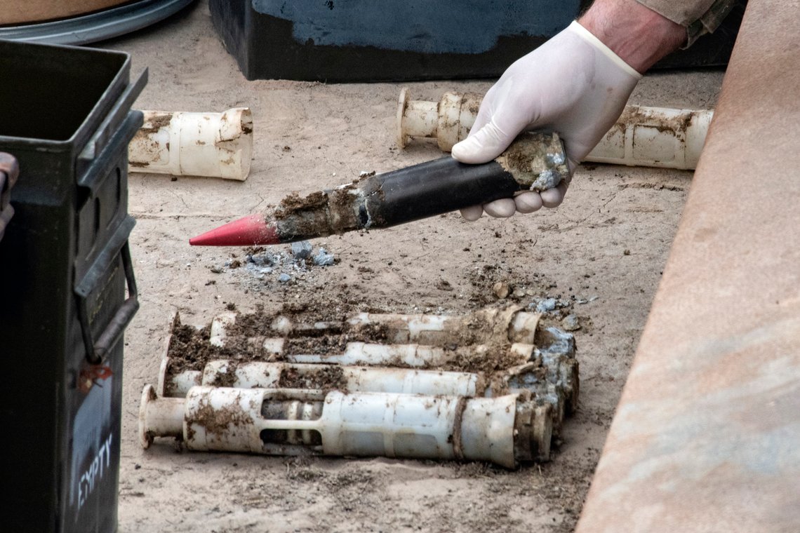 In this image provided by the U.S. Air National Guard, U.S. Air Force National Guard Explosive Ordnance Disposal Techinicians prepare several contaminated and compromised depleted uranium rounds on June 23, 2022 at Tooele Army Depot, Utah. (Staff Sgt. Nicholas Perez/U.S. Air National Guard via AP) In this image provided by the U.S. Air National Guard, U.S. Air Force National Guard Explosive Ordnance Disposal Techinicians prepare several contaminated and compromised depleted uranium rounds on June 23, 2022 at Tooele Army Depot, Utah. (Staff Sgt. Nicholas Perez/U.S. Air National Guard via AP)