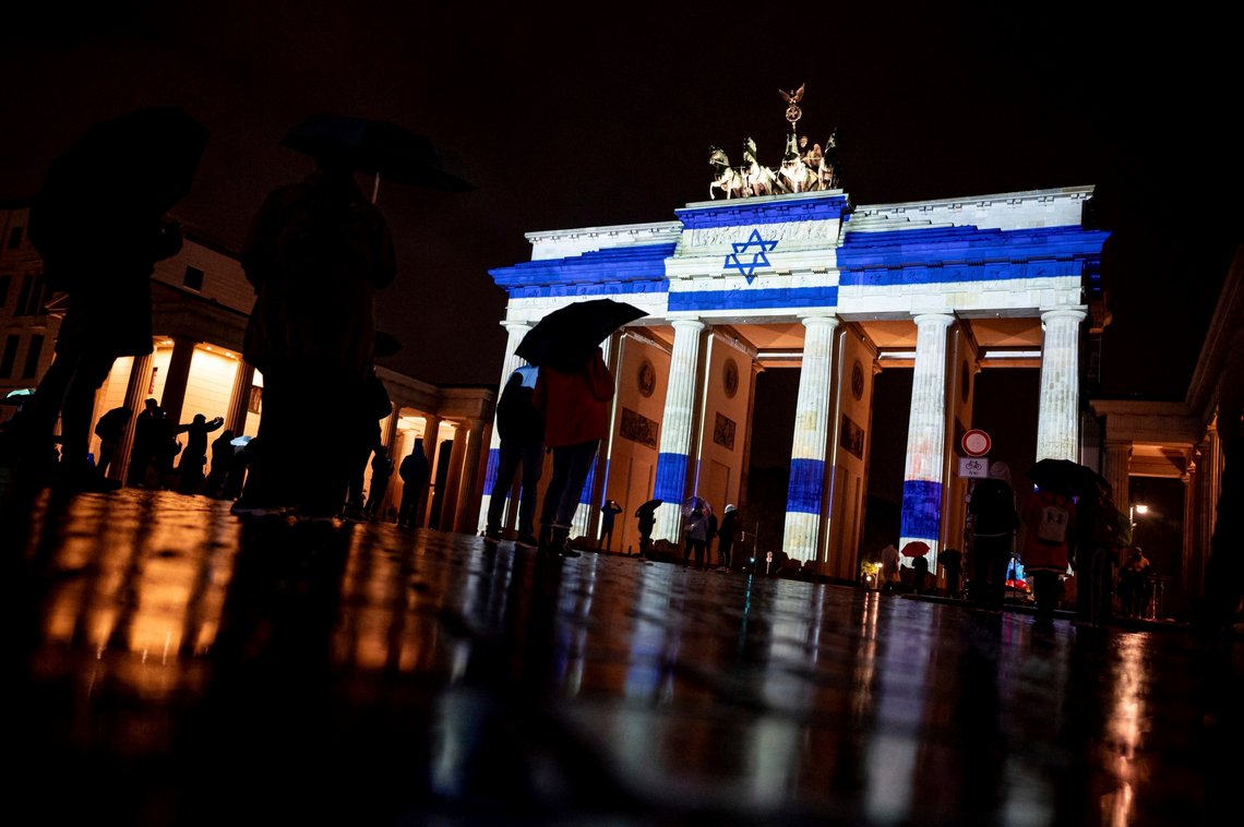 The Brandenburg Gate is illuminated in the colors of the Israeli flag as a show of solidarity, in Berlin, Germany, Saturday night, Oct. 7, 2023. (Fabian Sommer/dpa via AP) The Brandenburg Gate is illuminated in the colors of the Israeli flag as a show of solidarity, in Berlin, Germany, Saturday night, Oct. 7, 2023. (Fabian Sommer/dpa via AP)