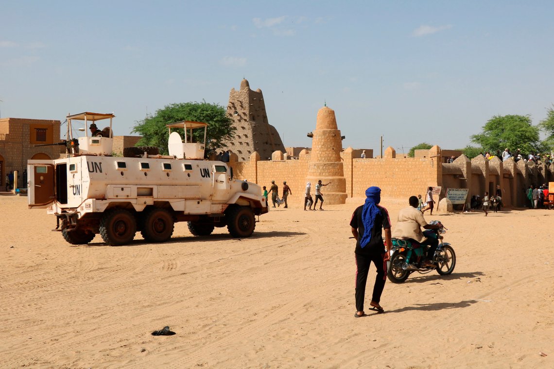 FILE - United Nation forces patrol the streets of Timbuktu, Mali, Sunday, Sept. 26, 2021. Mali’s military regime is struggling to fight growing violence in the West African nation's hard-hit northern region. That's after a peace deal signed several years ago with rebels appeared to have collapsed and as the United Nations peacekeepers who helped fight jihadi groups begin to leave. Attacks in northern Mali have more than doubled since U.N. peacekeepers completed the first phase of their withdrawal in Aug. 2023, after a decade of fighting Islamic extremists, resulting in more than 150 deaths. (AP Photo/Moulaye Sayah, File) FILE - United Nation forces patrol the streets of Timbuktu, Mali, Sunday, Sept. 26, 2021. Mali’s military regime is struggling to fight growing violence in the West African nation's hard-hit northern region. That's after a peace deal signed several years ago with rebels appeared to have collapsed and as the United Nations peacekeepers who helped fight jihadi groups begin to leave. Attacks in northern Mali have more than doubled since U.N. peacekeepers completed the first phase of their withdrawal in Aug. 2023, after a decade of fighting Islamic extremists, resulting in more than 150 deaths. (AP Photo/Moulaye Sayah, File)
