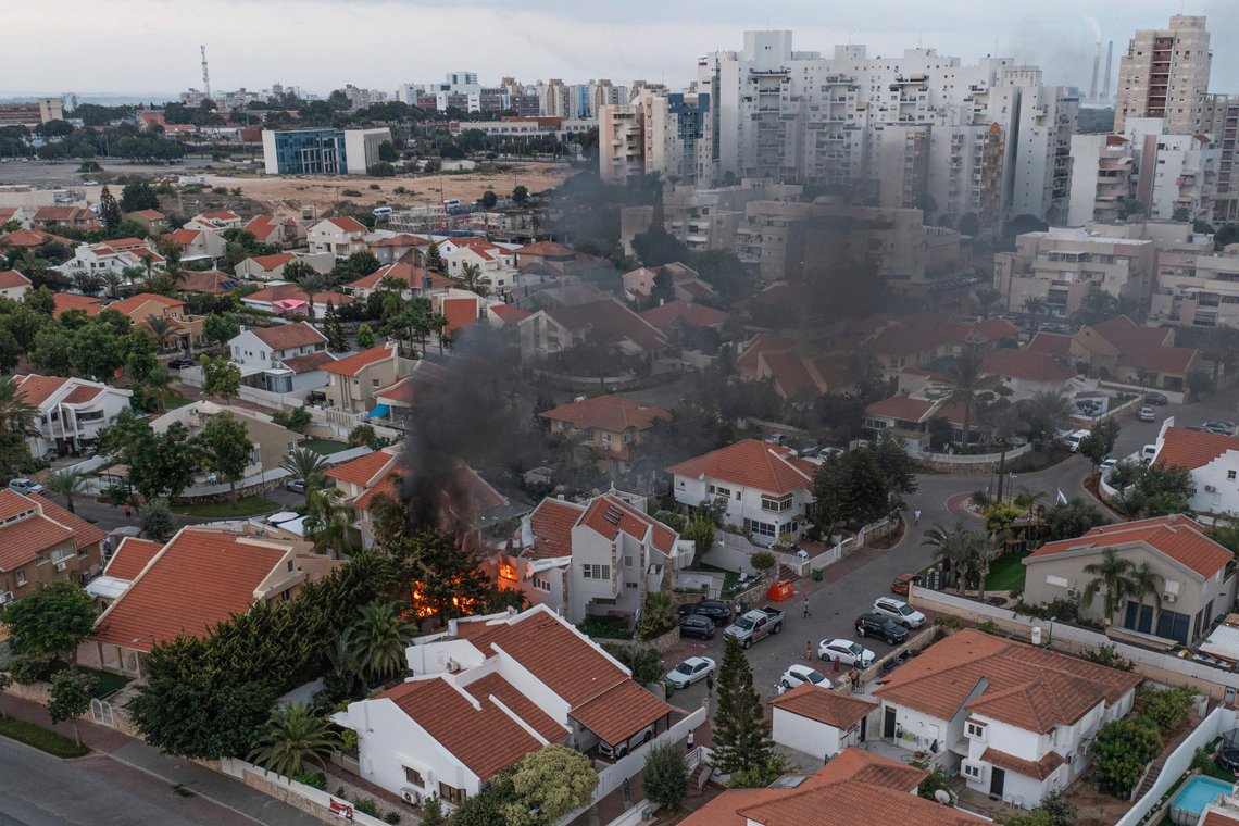 Smoke rises after a rocket fired from the Gaza Strip hit a house in Ashkelon, southern Israel, Saturday, Oct. 7, 2023. The rockets were fired as Hamas announced a new operation against Israel. (AP Photo/Tsafrir Abayov) Smoke rises after a rocket fired from the Gaza Strip hit a house in Ashkelon, southern Israel, Saturday, Oct. 7, 2023. The rockets were fired as Hamas announced a new operation against Israel. (AP Photo/Tsafrir Abayov)