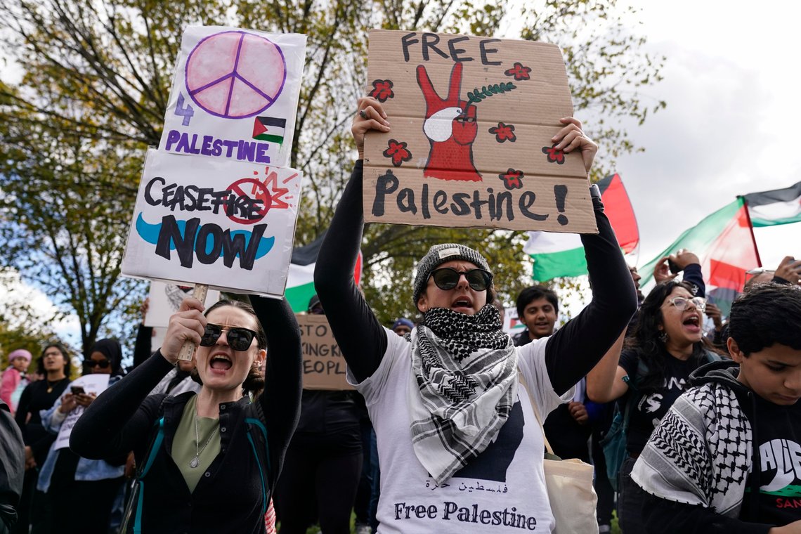 People hold signs during a pro-Palestinian march calling for a ceasefire in Gaza on Saturday, Oct. 21, 2023, in Washington. (AP Photo/Andrew Harnik) People hold signs during a pro-Palestinian march calling for a ceasefire in Gaza on Saturday, Oct. 21, 2023, in Washington. (AP Photo/Andrew Harnik)
