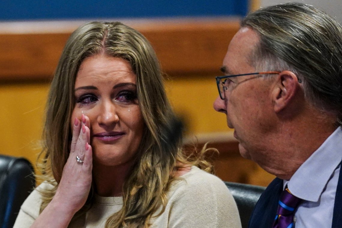 Jenna Ellis speaks with her attorney Franklin Hogue after Ellis plead guilty to a felony count of aiding and abetting false statements and writings, inside Fulton Superior Court Judge Scott McAfee's Fulton County Courtroom, Tuesday, Oct. 24, 2023, in Atlanta. Ellis, an attorney and prominent conservative media figure, reached a deal with prosecutors Tuesday, Oct. 24, 2023, and pleaded guilty to a reduced charge over efforts to overturn Donald Trump's 2020 election loss in Georgia.(AP Photo/John Bazemore, Pool) Jenna Ellis speaks with her attorney Franklin Hogue after Ellis plead guilty to a felony count of aiding and abetting false statements and writings, inside Fulton Superior Court Judge Scott McAfee's Fulton County Courtroom, Tuesday, Oct. 24, 2023, in Atlanta. Ellis, an attorney and prominent conservative media figure, reached a deal with prosecutors Tuesday, Oct. 24, 2023, and pleaded guilty to a reduced charge over efforts to overturn Donald Trump's 2020 election loss in Georgia.(AP Photo/John Bazemore, Pool)