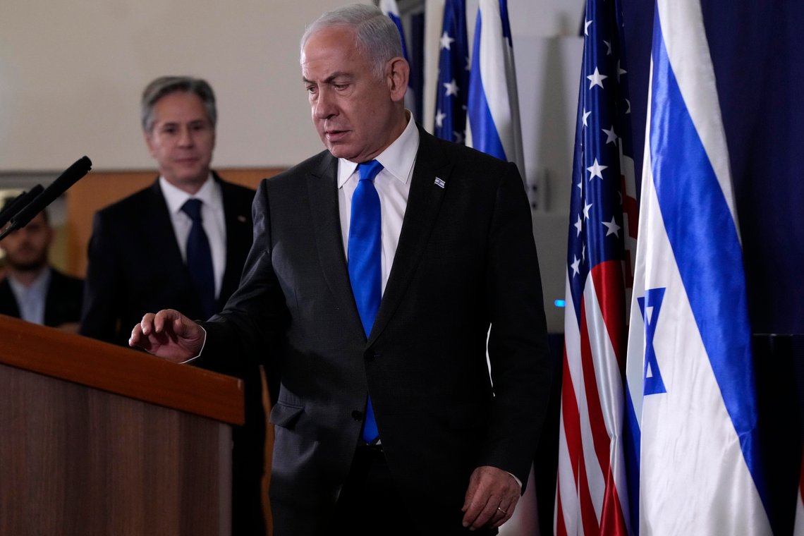 Israel's Prime Minister Benjamin Netanyahu arrives with the U.S. Secretary of State Antony Blinken to make statements to the media inside The Kirya, which houses the Israeli Ministry of Defense, after their meeting in Tel Aviv, Thursday Oct. 12, 2023. President Joe Biden is dispatching his top diplomat to Israel on an urgent mission to show U.S. support after the unprecedented attack by Hamas militants. (AP Photo/Jacquelyn Martin, pool) Israel's Prime Minister Benjamin Netanyahu arrives with the U.S. Secretary of State Antony Blinken to make statements to the media inside The Kirya, which houses the Israeli Ministry of Defense, after their meeting in Tel Aviv, Thursday Oct. 12, 2023. President Joe Biden is dispatching his top diplomat to Israel on an urgent mission to show U.S. support after the unprecedented attack by Hamas militants. (AP Photo/Jacquelyn Martin, pool)
