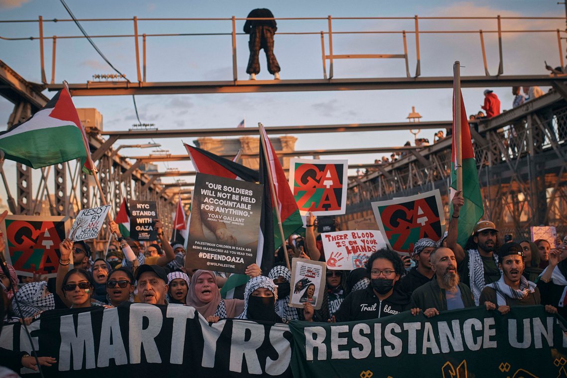 Palestinian supporters shout slogans as they cross the Brooklyn Bridge during a demonstration demanding a cease-fire on Saturday, Oct. 28, 2023, in New York. (AP Photo/Andres Kudacki) Palestinian supporters shout slogans as they cross the Brooklyn Bridge during a demonstration demanding a cease-fire on Saturday, Oct. 28, 2023, in New York. (AP Photo/Andres Kudacki)