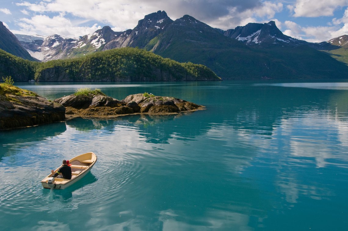 Boat on Norwegian fjord. Photo: Shutterstock by Geir Olav Lyngfjell. Boat on Norwegian fjord. Photo: Shutterstock by Geir Olav Lyngfjell.