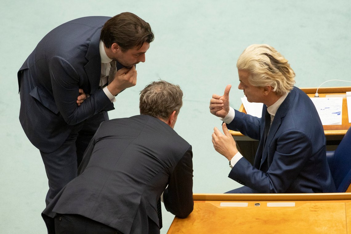 Populist Dutch anti-immigration lawmaker Geert Wilders, right, Thierry Baudet, leader of right-wing populist party Forum for Democracy, left, and fellow party member Wybren van Haga, center, talk during a debate in parliament in The Hague, Netherlands, early Friday, April 2, 2021. Caretaker Dutch Prime Minister Mark Rutte was fighting for his political life in a bitter parliamentary debate about the country's derailed process of forming a new ruling coalition following elections last month. (AP Photo/Peter Dejong) Populist Dutch anti-immigration lawmaker Geert Wilders, right, Thierry Baudet, leader of right-wing populist party Forum for Democracy, left, and fellow party member Wybren van Haga, center, talk during a debate in parliament in The Hague, Netherlands, early Friday, April 2, 2021. Caretaker Dutch Prime Minister Mark Rutte was fighting for his political life in a bitter parliamentary debate about the country's derailed process of forming a new ruling coalition following elections last month. (AP Photo/Peter Dejong)
