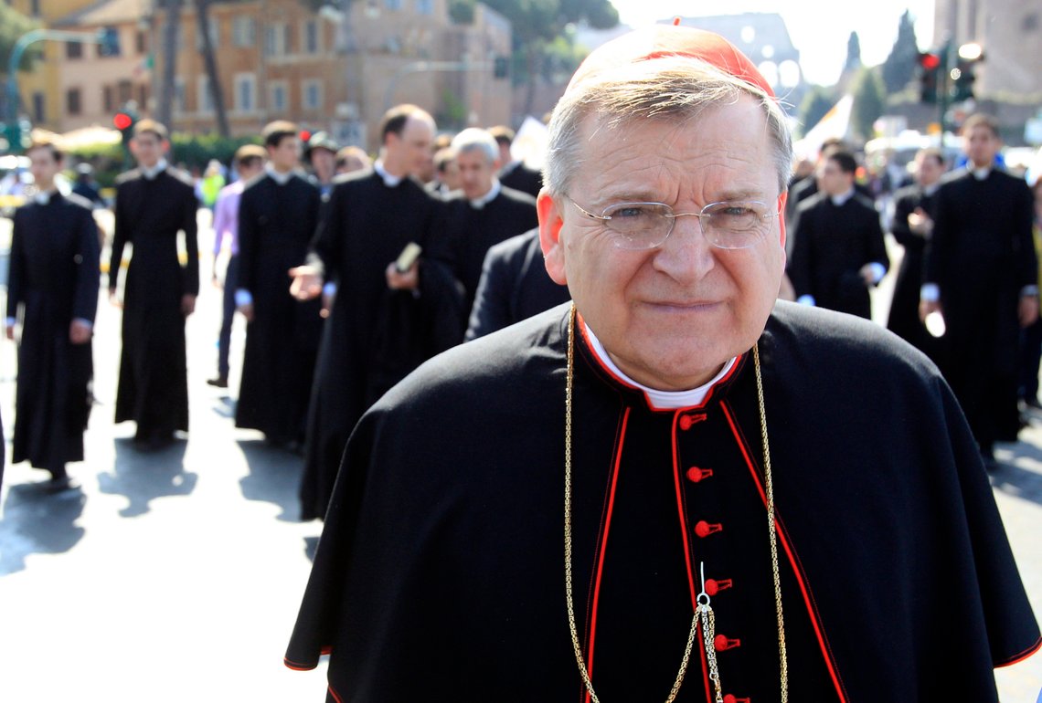 FILE - This May 13, 2012 file photo shows Cardinal Raymond Leo Burke, of the United States, taking part in an anti-abortion march in Rome. The resignation of Pope Benedict XVI on Feb. 28, 2013 opens the door to a host of possible successors, from the cardinal of Milan to a contender from Ghana and several Latin Americans. Top candidates for Benedict's succession from the U.S. include Cardinal Timothy Dolan of New York and Cardinal Raymond Burke, an arch-conservative and the Vatican's top judge. (AP Photo/Riccardo De Luca, files) FILE - This May 13, 2012 file photo shows Cardinal Raymond Leo Burke, of the United States, taking part in an anti-abortion march in Rome. The resignation of Pope Benedict XVI on Feb. 28, 2013 opens the door to a host of possible successors, from the cardinal of Milan to a contender from Ghana and several Latin Americans. Top candidates for Benedict's succession from the U.S. include Cardinal Timothy Dolan of New York and Cardinal Raymond Burke, an arch-conservative and the Vatican's top judge. (AP Photo/Riccardo De Luca, files)