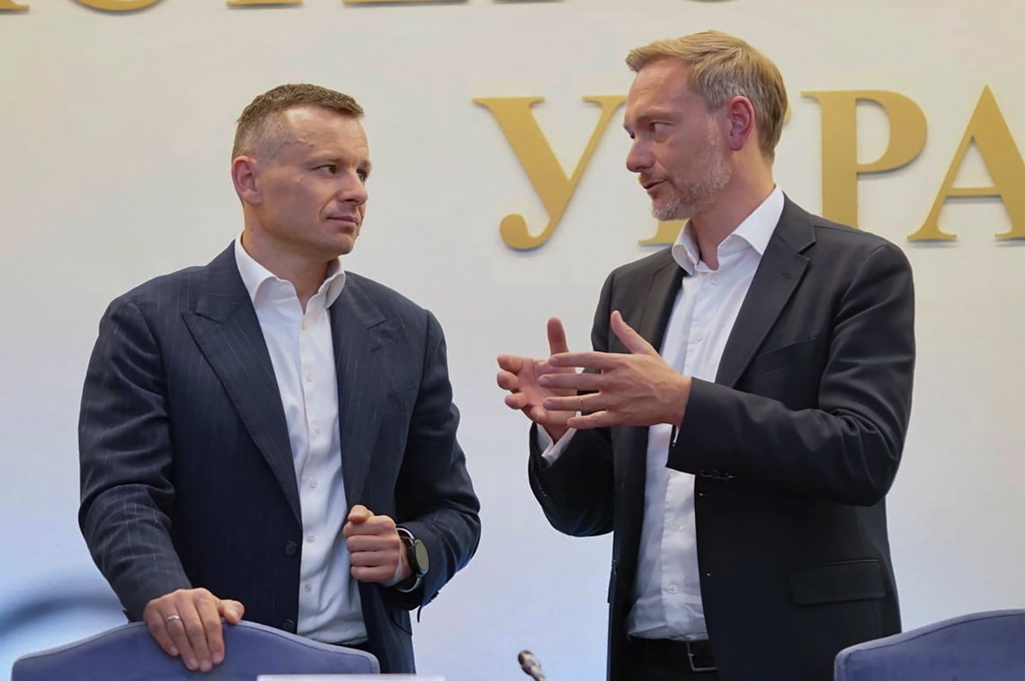 In this photo provided by the Finance Ministry of Ukraine Press Office, Ukrainian Finance Minister Sergii Marchenko, left, and Federal Minister of Finance of Germany Christian Lindner chat during their meeting in Kyiv, Ukraine, Monday, Aug. 14, 2023. (Finance Ministry of Ukraine Press Office via AP) In this photo provided by the Finance Ministry of Ukraine Press Office, Ukrainian Finance Minister Sergii Marchenko, left, and Federal Minister of Finance of Germany Christian Lindner chat during their meeting in Kyiv, Ukraine, Monday, Aug. 14, 2023. (Finance Ministry of Ukraine Press Office via AP)