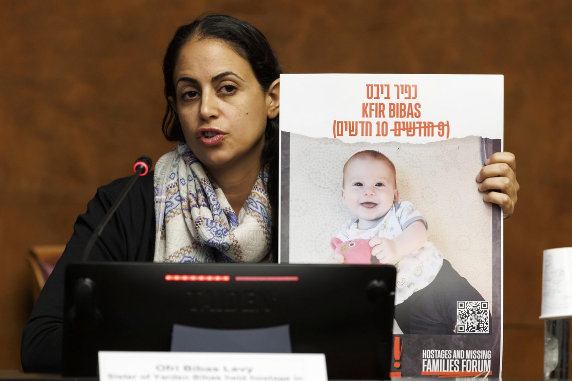 FILE - Ofri Bibas Levy, sister of Yarden Bibas, held hostage in Gaza with his wife, Shiri and two kids, Kfir and Ariel, talks to the media, during a press conference at the European headquarters of the United Nations in Geneva, Switzerland, Tuesday, Nov. 14, 2023. (Salvatore Di Nolfi/Keystone via AP) FILE - Ofri Bibas Levy, sister of Yarden Bibas, held hostage in Gaza with his wife, Shiri and two kids, Kfir and Ariel, talks to the media, during a press conference at the European headquarters of the United Nations in Geneva, Switzerland, Tuesday, Nov. 14, 2023. (Salvatore Di Nolfi/Keystone via AP)