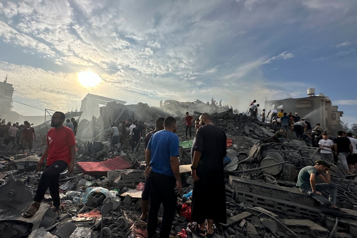 Palestinians look for survivors following Israeli airstrike in Nusseirat refugee camp, Gaza Strip, Tuesday, Oct. 31, 2023. (AP Photo/Doaa AlBaz) Palestinians look for survivors following Israeli airstrike in Nusseirat refugee camp, Gaza Strip, Tuesday, Oct. 31, 2023. (AP Photo/Doaa AlBaz)