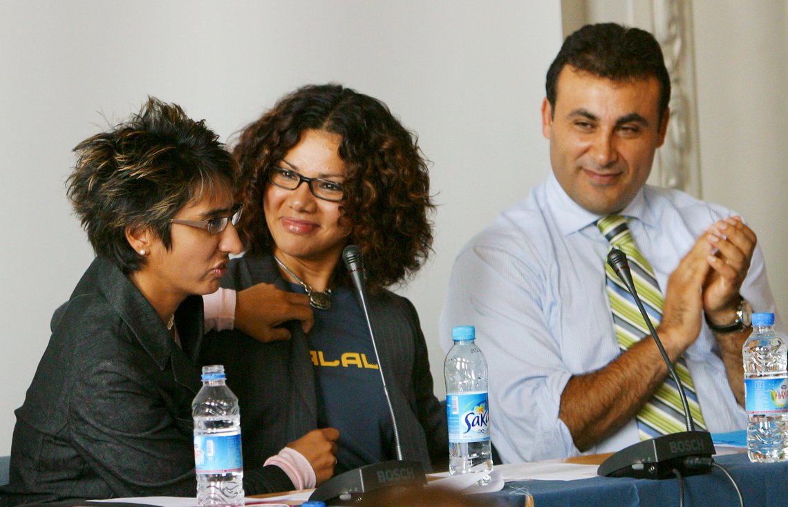 Canadian author Irshad Manji, left, shows the t-shirt of Mona Eltahawy, which reads "Halal," or "permissible" at a moderate Muslims conference in Copenhagen, Denmark Saturday Sept. 30, 2006. The cartoons of the Prophet Muhammad first published a year ago by a Danish newspaper has allowed moderate Muslims around the world break out of anonymity and show that Islam is not one homogenous bloc, speakers at a conference on the aftermaths of the crisis said Saturday. At right is Danish politician Naser Khader. (AP Photo/John McConnico) Canadian author Irshad Manji, left, shows the t-shirt of Mona Eltahawy, which reads "Halal," or "permissible" at a moderate Muslims conference in Copenhagen, Denmark Saturday Sept. 30, 2006. The cartoons of the Prophet Muhammad first published a year ago by a Danish newspaper has allowed moderate Muslims around the world break out of anonymity and show that Islam is not one homogenous bloc, speakers at a conference on the aftermaths of the crisis said Saturday. At right is Danish politician Naser Khader. (AP Photo/John McConnico)