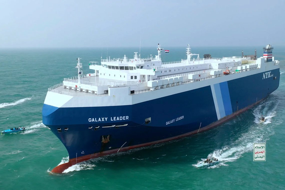 This photo released by the Houthi Media Center shows Houthi escort the cargo ship Galaxy Leader on Sunday, Nov. 19, 2023. Yemen's Houthis have seized the ship in the Red Sea off the coast of Yemen after threatening to seize all vessels owned by Israeli companies. (Houthi Media Center via AP) This photo released by the Houthi Media Center shows Houthi escort the cargo ship Galaxy Leader on Sunday, Nov. 19, 2023. Yemen's Houthis have seized the ship in the Red Sea off the coast of Yemen after threatening to seize all vessels owned by Israeli companies. (Houthi Media Center via AP)