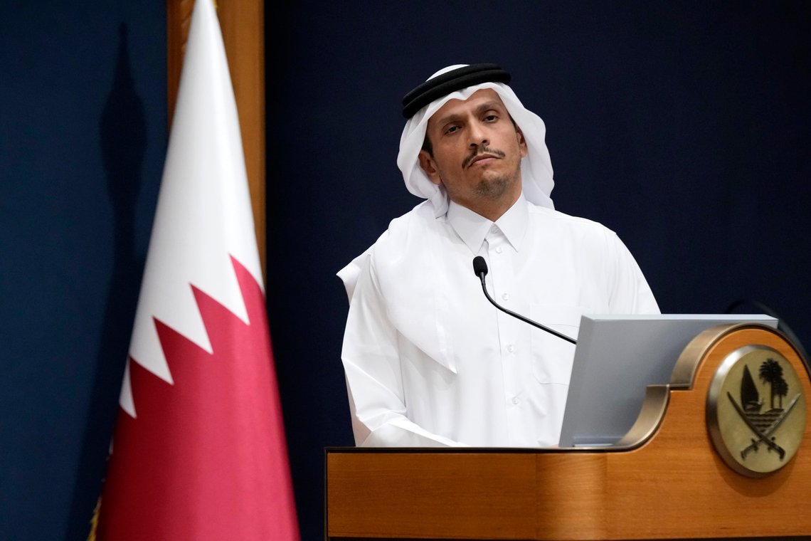FILE - Qatar's Prime Minister and Foreign Minister Mohammed bin Abdulrahman Al Thani listens a question with U.S. Secretary of State Antony Blinken in Doha, Qatar, Friday Oct. 13, 2023. Qatar is the go-to mediator in the Israel-Hamas war. On Saturday, Nov. 25, 2023, a Qatari jet landed in Israel's Ben-Gurion International Airport with an urgent task: save the cease-fire deal between Israel and Gaza's Hamas rulers. (AP Photo/Jacquelyn Martin, Pool, File) FILE - Qatar's Prime Minister and Foreign Minister Mohammed bin Abdulrahman Al Thani listens a question with U.S. Secretary of State Antony Blinken in Doha, Qatar, Friday Oct. 13, 2023. Qatar is the go-to mediator in the Israel-Hamas war. On Saturday, Nov. 25, 2023, a Qatari jet landed in Israel's Ben-Gurion International Airport with an urgent task: save the cease-fire deal between Israel and Gaza's Hamas rulers. (AP Photo/Jacquelyn Martin, Pool, File)
