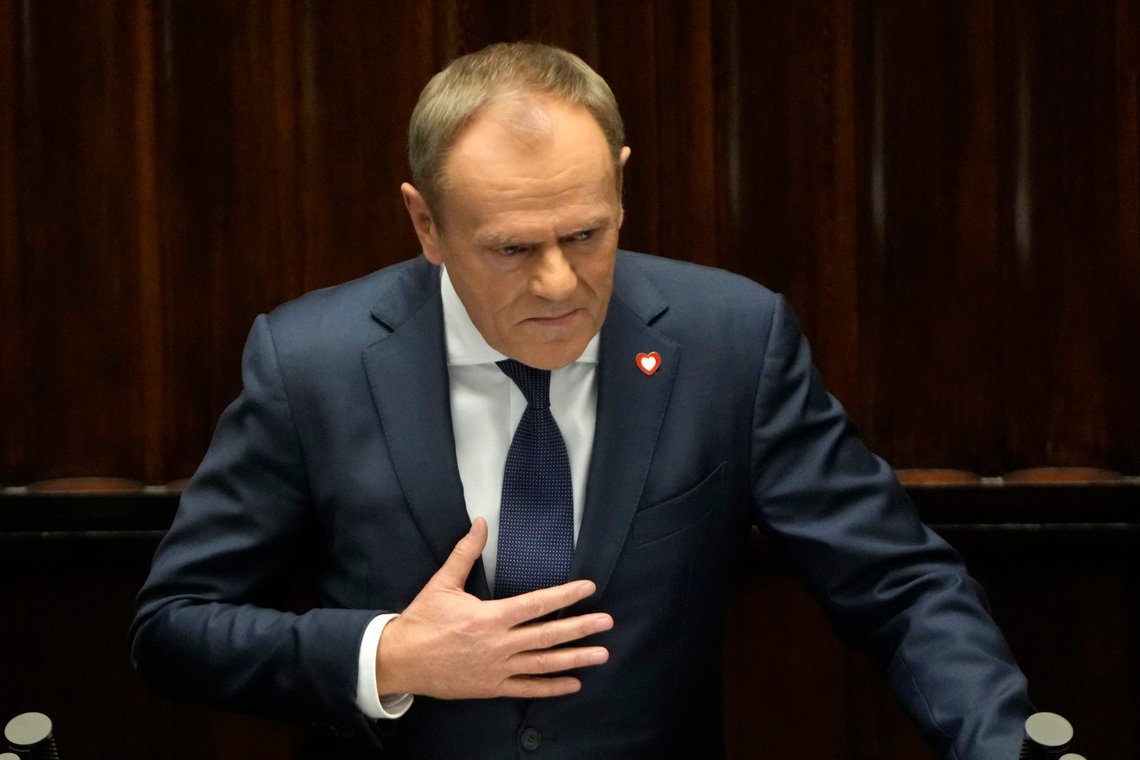 Newly elected Poland's Prime Minister Donald Tusk addresses lawmakers during his speech at the parliament in Warsaw, Poland, Tuesday Dec. 12, 2023. (AP Photo/Czarek Sokolowski) Newly elected Poland's Prime Minister Donald Tusk addresses lawmakers during his speech at the parliament in Warsaw, Poland, Tuesday Dec. 12, 2023. (AP Photo/Czarek Sokolowski)