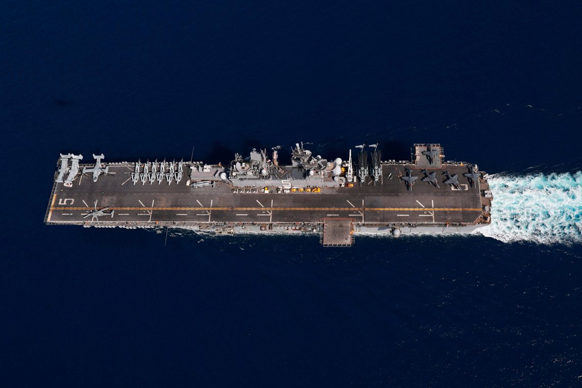 In this photo released by the U.S. Navy, the amphibious assault ship USS Bataan travels through the Red Sea, Tuesday, Aug. 8, 2023. Western-backed maritime forces in the Middle East on Saturday, Aug. 12, warned shippers traveling through the strategic Strait of Hormuz to stay as far away from Iranian territorial waters as possible to avoid being seized, a stark advisory amid heightened tensions between Iran and the U.S. (Mass Communication Specialist 3rd Class Riley Gasdia/U.S. Navy, via AP) In this photo released by the U.S. Navy, the amphibious assault ship USS Bataan travels through the Red Sea, Tuesday, Aug. 8, 2023. Western-backed maritime forces in the Middle East on Saturday, Aug. 12, warned shippers traveling through the strategic Strait of Hormuz to stay as far away from Iranian territorial waters as possible to avoid being seized, a stark advisory amid heightened tensions between Iran and the U.S. (Mass Communication Specialist 3rd Class Riley Gasdia/U.S. Navy, via AP)