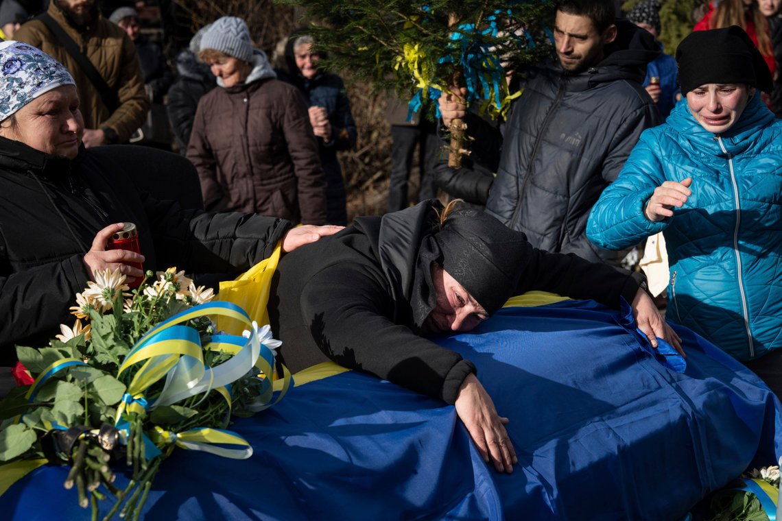 Hanna Boichuk cries during the funeral ceremony of her son Vasyl Boichuk, a Ukrainian serviceman who was killed in Mykolayiv in March 2022, in Verkhovyna, Ukraine, Tuesday, Dec. 26, 2023. (AP Photo/Evgeniy Maloletka) Hanna Boichuk cries during the funeral ceremony of her son Vasyl Boichuk, a Ukrainian serviceman who was killed in Mykolayiv in March 2022, in Verkhovyna, Ukraine, Tuesday, Dec. 26, 2023. (AP Photo/Evgeniy Maloletka)