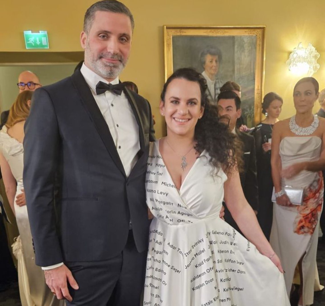 Photo courtesy of Galith Nadbornik accompanied by her husband Yaron Nadbornik wearing a custom made ivory satin evening dress by Batel Lindström to Finland Independence Day president ball. Photo courtesy of Galith Nadbornik accompanied by her husband Yaron Nadbornik wearing a custom made ivory satin evening dress by Batel Lindström to Finland Independence Day president ball.