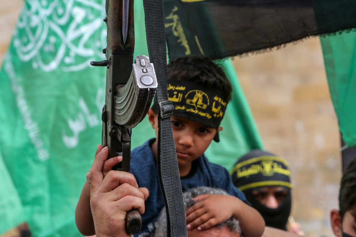 Supporters of Hamas and Islamic Jihad take part in a rally to celebrate the shooting attacks in Israel, in Gaza Strip, on April 8, 2022. Palestinians celebrate the shooting attacks in Tel Aviv, Israel. Photo: Shutterstock by Anas-Mohammed, Palestine. Supporters of Hamas and Islamic Jihad take part in a rally to celebrate the shooting attacks in Israel, in Gaza Strip, on April 8, 2022. Palestinians celebrate the shooting attacks in Tel Aviv, Israel. Photo: Shutterstock by Anas-Mohammed, Palestine.