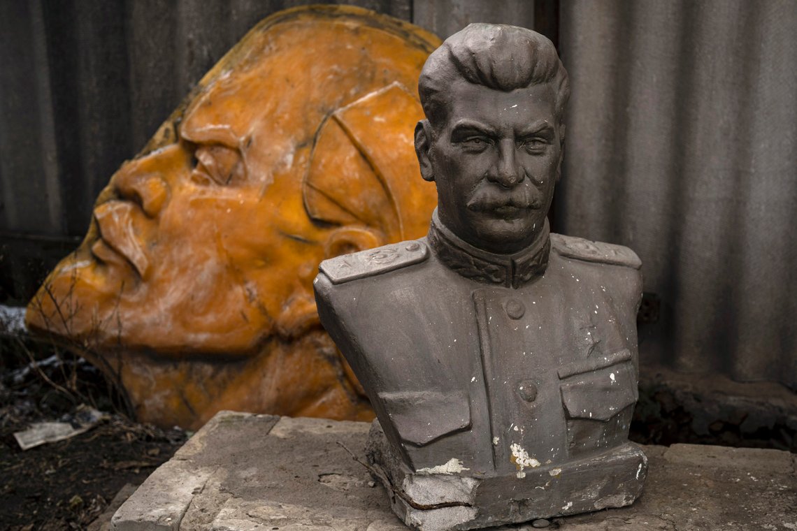 Discarded communist era statues depicting Stalin, front, and Lenin lay on the ground outside a glass workshop in Kharkiv, Ukraine, Tuesday, Feb. 28, 2023. (AP Photo/Vadim Ghirda) Discarded communist era statues depicting Stalin, front, and Lenin lay on the ground outside a glass workshop in Kharkiv, Ukraine, Tuesday, Feb. 28, 2023. (AP Photo/Vadim Ghirda)