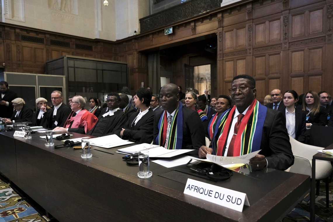 Ambassador of the Republic of South Africa to the Netherlands Vusimuzi Madonsela, right, and Minister of Justice and Correctional Services of South Africa Ronald Lamola, center, during the opening of the hearings at the International Court of Justice in The Hague, Netherlands, Thursday, Jan. 11, 2024. The United Nations' top court opens hearings Thursday into South Africa's allegation that Israel's war with Hamas amounts to genocide against Palestinians, a claim that Israel strongly denies. (AP Photo/Patrick Post) Ambassador of the Republic of South Africa to the Netherlands Vusimuzi Madonsela, right, and Minister of Justice and Correctional Services of South Africa Ronald Lamola, center, during the opening of the hearings at the International Court of Justice in The Hague, Netherlands, Thursday, Jan. 11, 2024. The United Nations' top court opens hearings Thursday into South Africa's allegation that Israel's war with Hamas amounts to genocide against Palestinians, a claim that Israel strongly denies. (AP Photo/Patrick Post)