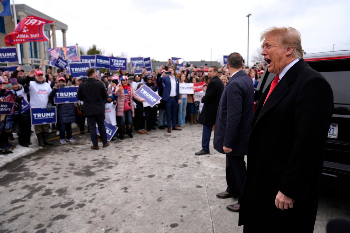 Republican presidential candidate former President Donald Trump, right, greets supporters as he arrives at a campaign stop in Londonderry, N.H., Tuesday, Jan. 23, 2024. (AP Photo/Matt Rourke) Republican presidential candidate former President Donald Trump, right, greets supporters as he arrives at a campaign stop in Londonderry, N.H., Tuesday, Jan. 23, 2024. (AP Photo/Matt Rourke)