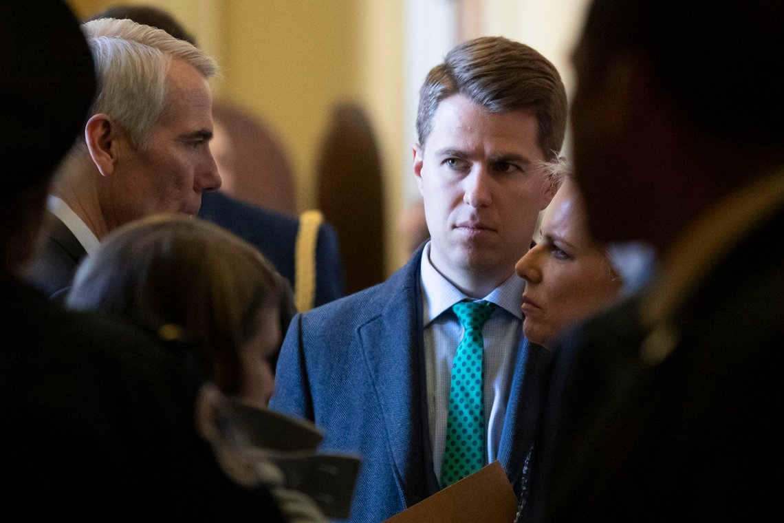 FILE - In this March 5, 2019, photo, Sen. Rob Portman, R-Ohio, left, talks with Homeland Security Secretary Kirstjen Nielsen, right, and her chief of staff Miles Taylor depart after the Republican Caucus luncheon on Capitol Hill in Washington. Taylor who penned a scathing anti-Trump op-ed and book under the pen name "Anonymous" made his identify public, Oct. 28, 2020. (AP Photo/Alex Brandon) FILE - In this March 5, 2019, photo, Sen. Rob Portman, R-Ohio, left, talks with Homeland Security Secretary Kirstjen Nielsen, right, and her chief of staff Miles Taylor depart after the Republican Caucus luncheon on Capitol Hill in Washington. Taylor who penned a scathing anti-Trump op-ed and book under the pen name "Anonymous" made his identify public, Oct. 28, 2020. (AP Photo/Alex Brandon)