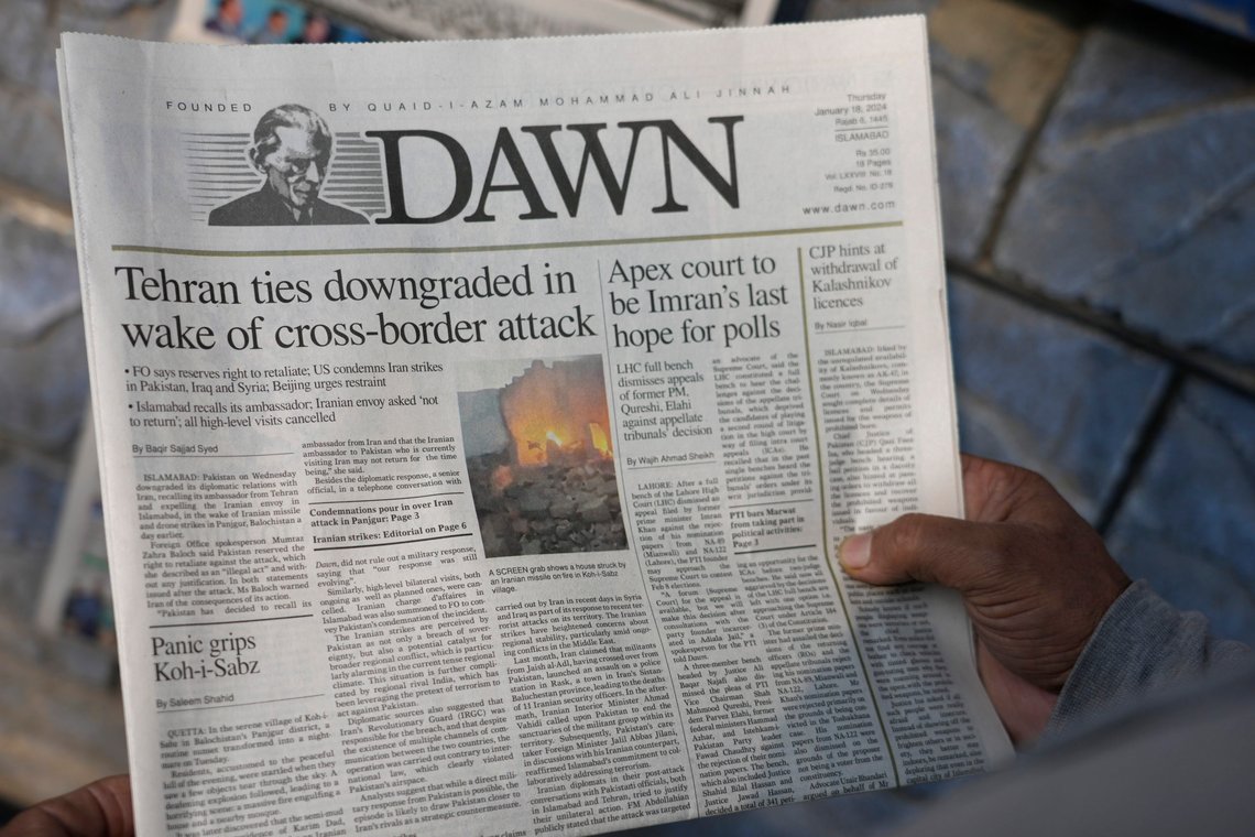 A Pakistani reads the front page of a morning newspaper covering Iran's strike, at a stall in Islamabad, Pakistan, Thursday, Jan. 18, 2024. Pakistan's air force launched retaliatory airstrikes early Thursday on Iran allegedly targeting militant positions, an attack that killed at least seven people and further raised tensions between the neighboring nations. (AP Photo/Anjum Naveed) A Pakistani reads the front page of a morning newspaper covering Iran's strike, at a stall in Islamabad, Pakistan, Thursday, Jan. 18, 2024. Pakistan's air force launched retaliatory airstrikes early Thursday on Iran allegedly targeting militant positions, an attack that killed at least seven people and further raised tensions between the neighboring nations. (AP Photo/Anjum Naveed)