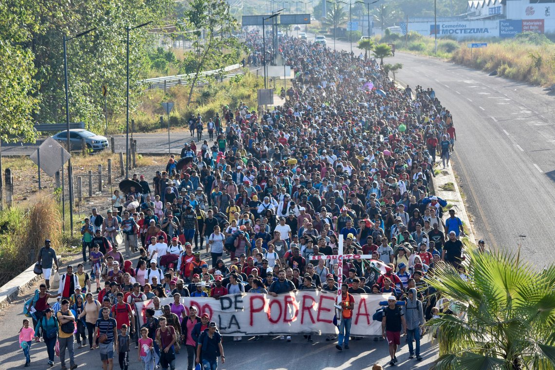 Migrants depart from Tapachula, Mexico, Sunday, Dec. 24, 2023. The caravan started the trek north through Mexico just days before U.S. Secretary of State Antony Blinken arrives in Mexico City to discuss new agreements to control the surge of migrants seeking entry into the United States. (AP Photo/Edgar H. Clemente) Migrants depart from Tapachula, Mexico, Sunday, Dec. 24, 2023. The caravan started the trek north through Mexico just days before U.S. Secretary of State Antony Blinken arrives in Mexico City to discuss new agreements to control the surge of migrants seeking entry into the United States. (AP Photo/Edgar H. Clemente)