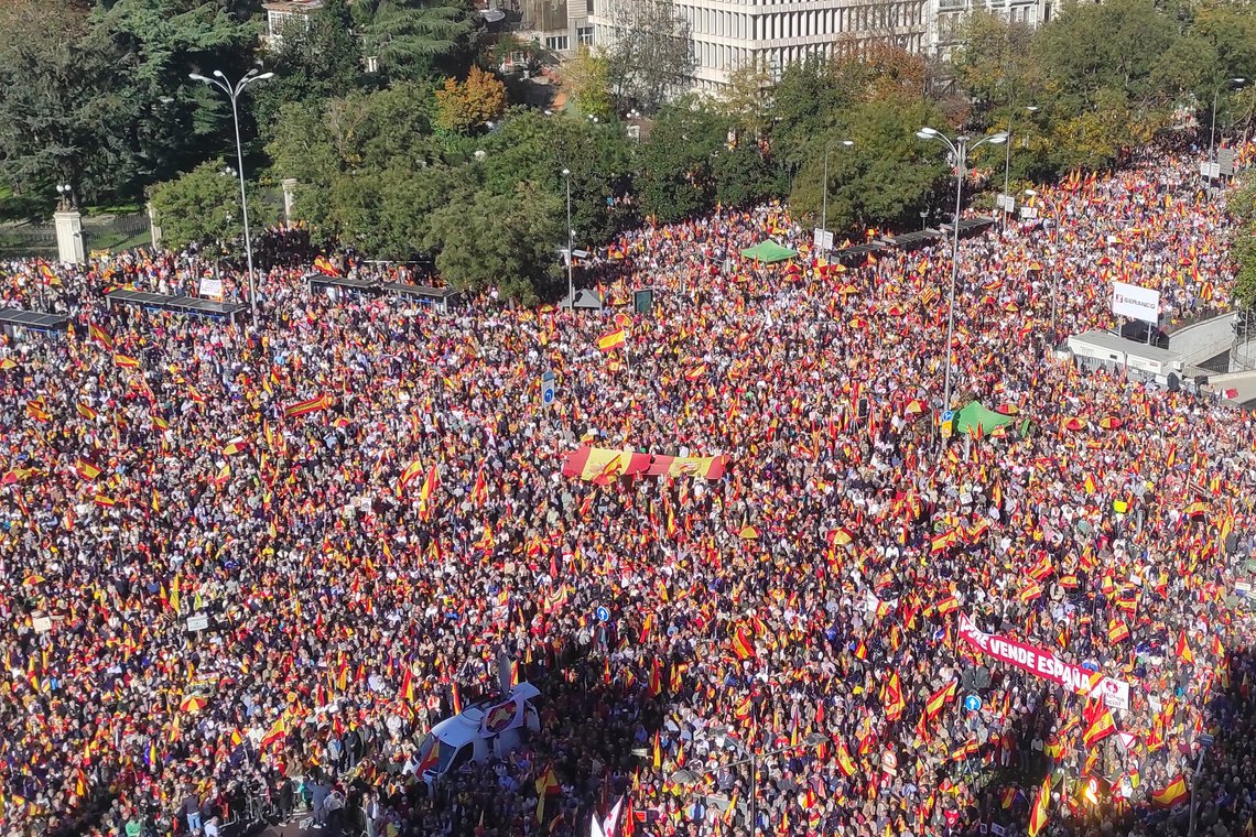 FILE - Protesters pack the central Cibeles square in Madrid, Spain, Saturday, Nov. 18, 2023, during a demonstration against a potential amnesty law. Spain's lower house of Parliament is Tuesday to debate and likely approve an enormously controversial amnesty law that aims to sweep away the legal troubles of hundreds of people, involved in Catalonia's unsuccessful 2017 independence bid. A key question is whether a Catalan separatist party manages to include clauses that cover terrorism that will guarantee protection for fugitive leader Carles Puigdemont. (AP Photo/Alicia Leon, File) FILE - Protesters pack the central Cibeles square in Madrid, Spain, Saturday, Nov. 18, 2023, during a demonstration against a potential amnesty law. Spain's lower house of Parliament is Tuesday to debate and likely approve an enormously controversial amnesty law that aims to sweep away the legal troubles of hundreds of people, involved in Catalonia's unsuccessful 2017 independence bid. A key question is whether a Catalan separatist party manages to include clauses that cover terrorism that will guarantee protection for fugitive leader Carles Puigdemont. (AP Photo/Alicia Leon, File)