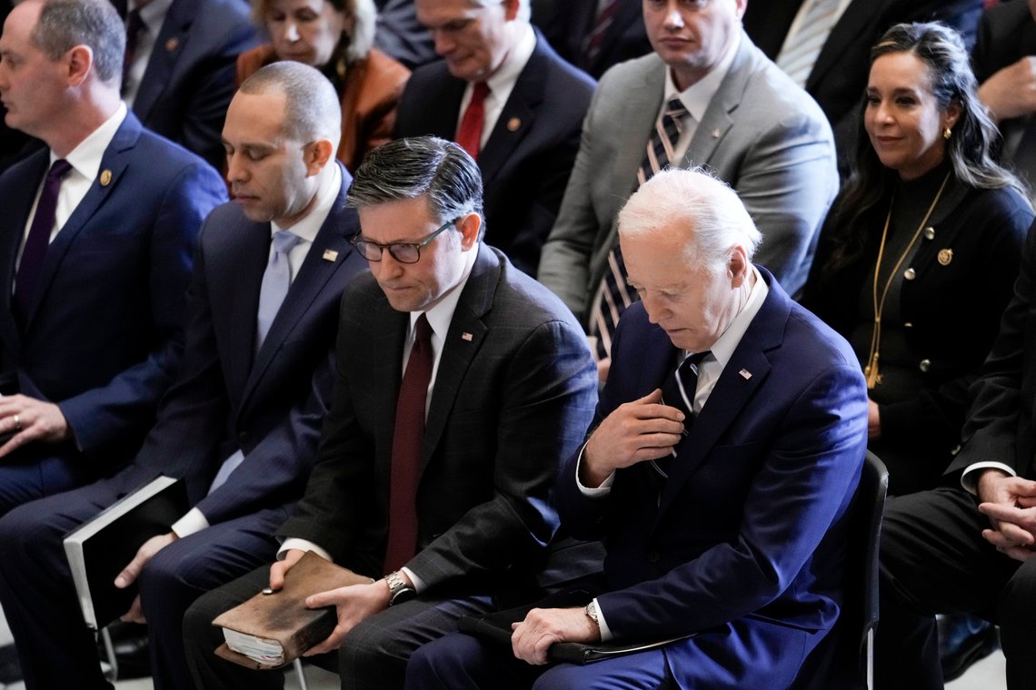President Joe Biden, with from left, House Minority Leader Hakeem Jeffries, D-N.Y., and House Speaker Mike Johnson of La., pray an listen during the National Prayer Breakfast, Thursday, Feb. 1, 2024, at the Capitol in Washington. (AP Photo/J. Scott Applewhite) President Joe Biden, with from left, House Minority Leader Hakeem Jeffries, D-N.Y., and House Speaker Mike Johnson of La., pray an listen during the National Prayer Breakfast, Thursday, Feb. 1, 2024, at the Capitol in Washington. (AP Photo/J. Scott Applewhite)