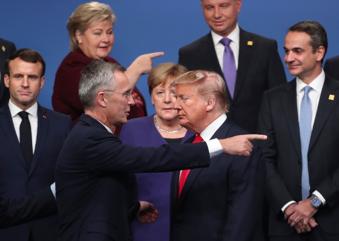 FILE - In this Dec. 4, 2019, file photo, NATO Secretary General Jens Stoltenberg, center front left, speaks with U.S. President Donald Trump, center front right, after a group photo at a NATO leaders meeting at The Grove hotel and resort in Watford, Hertfordshire, England. From left, French President Emmanuel Macron, Norway's Prime Minister Erna Solberg, German Chancellor Angela Merkel, Poland's President Andrzej Duda and Greek Prime Minister Kyriakos Mitsotakis. People have taken to the streets around the world to demonstrate in support of Black Lives Matter protesters in the United States and to vent anger over Trump’s response to the police killing of George Floyd. But leaders of traditional allies of the United States have taken pains to avoid criticizing Trump directly. (AP Photo/Francisco Seco, File) FILE - In this Dec. 4, 2019, file photo, NATO Secretary General Jens Stoltenberg, center front left, speaks with U.S. President Donald Trump, center front right, after a group photo at a NATO leaders meeting at The Grove hotel and resort in Watford, Hertfordshire, England. From left, French President Emmanuel Macron, Norway's Prime Minister Erna Solberg, German Chancellor Angela Merkel, Poland's President Andrzej Duda and Greek Prime Minister Kyriakos Mitsotakis. People have taken to the streets around the world to demonstrate in support of Black Lives Matter protesters in the United States and to vent anger over Trump’s response to the police killing of George Floyd. But leaders of traditional allies of the United States have taken pains to avoid criticizing Trump directly. (AP Photo/Francisco Seco, File)