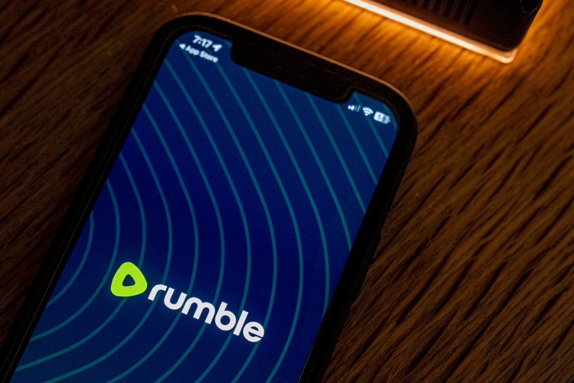 An iPhone displaying the logo for the Rumble app, Saturday, Sept. 23, 2023, in Washington. The exclusive online livestream for the second Republican presidential debate this week will take place on Rumble, an alternative video sharing platform that has been criticized for allowing far-right extremism, bigotry, election disinformation and conspiracy theories. (AP Photo/Andrew Harnik) An iPhone displaying the logo for the Rumble app, Saturday, Sept. 23, 2023, in Washington. The exclusive online livestream for the second Republican presidential debate this week will take place on Rumble, an alternative video sharing platform that has been criticized for allowing far-right extremism, bigotry, election disinformation and conspiracy theories. (AP Photo/Andrew Harnik)
