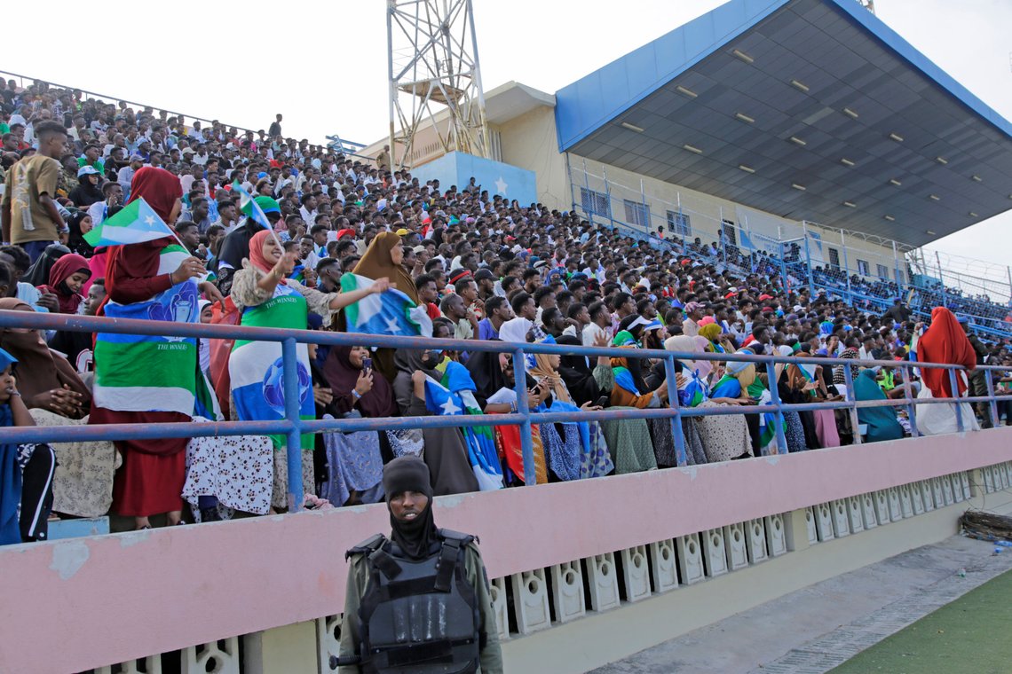Fans watch the soccer league match between Hirshabele and Jubaland at a stadium in Mogadishu, Somalia, Tuesday, Jan 23, 2024. Somali authorities have in recent years been working to restore the national stadium in Mogadishu. A stadium in the violence-prone Somali capital is hosting its first soccer tournament in three decades, drawing thousands of people to a sports facility that had fallen into disuse and later became a military base amid civil war. (AP Photo/Farah Abdi Warsameh) Fans watch the soccer league match between Hirshabele and Jubaland at a stadium in Mogadishu, Somalia, Tuesday, Jan 23, 2024. Somali authorities have in recent years been working to restore the national stadium in Mogadishu. A stadium in the violence-prone Somali capital is hosting its first soccer tournament in three decades, drawing thousands of people to a sports facility that had fallen into disuse and later became a military base amid civil war. (AP Photo/Farah Abdi Warsameh)