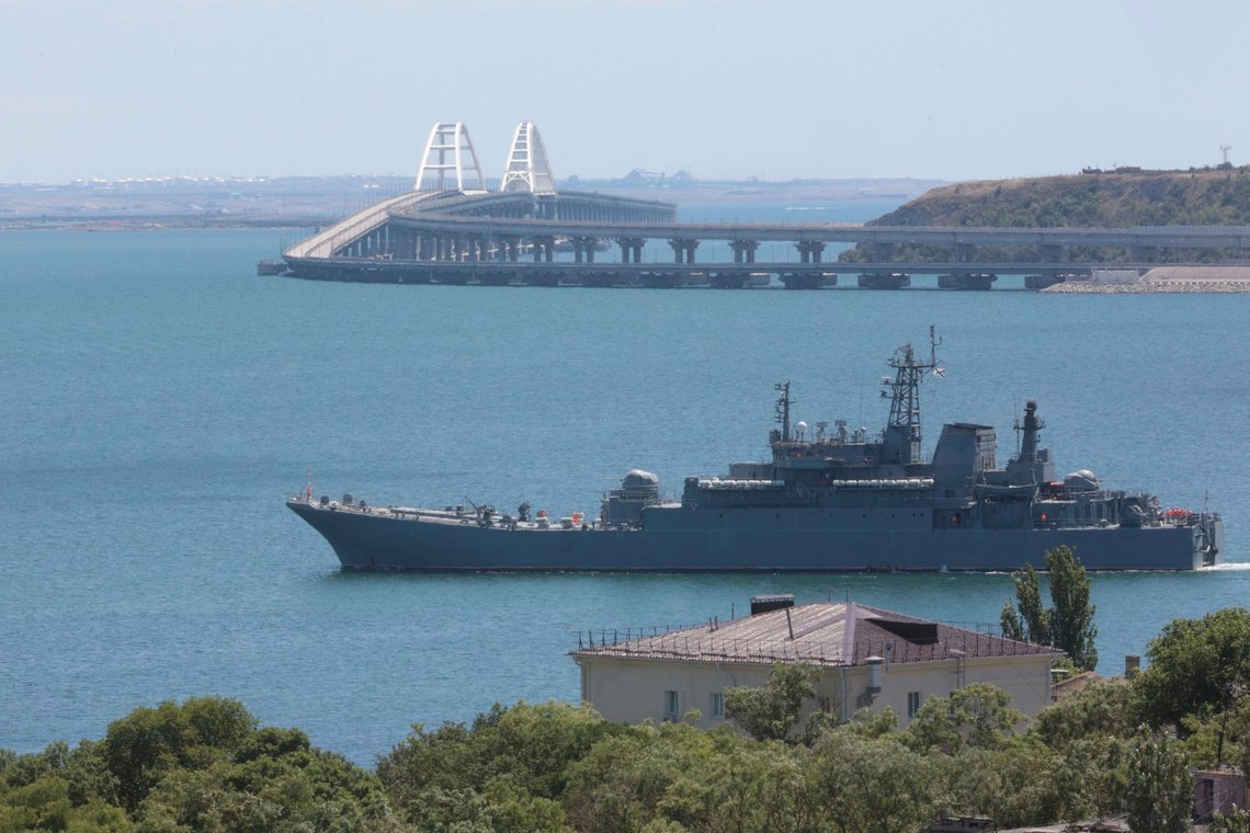 A Russian military large landing ship, which now transports cars and people between Crimea and Taman because the Crimean Bridge connecting Russian mainland and Crimean peninsula over the Kerch Strait is closed, sails not far from Kerch, Crimea, on Monday, July 17, 2023. An attack before dawn damaged part of a bridge linking Russia to Moscow-annexed Crimea that is a key supply route for Kremlin forces in the war with Ukraine. The strike Monday has forced the span's temporary closure for a second time in less than a year. (AP Photo) A Russian military large landing ship, which now transports cars and people between Crimea and Taman because the Crimean Bridge connecting Russian mainland and Crimean peninsula over the Kerch Strait is closed, sails not far from Kerch, Crimea, on Monday, July 17, 2023. An attack before dawn damaged part of a bridge linking Russia to Moscow-annexed Crimea that is a key supply route for Kremlin forces in the war with Ukraine. The strike Monday has forced the span's temporary closure for a second time in less than a year. (AP Photo)