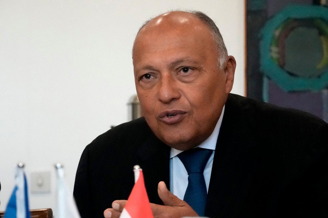 Egypt's Foreign Minister Sameh Shoukry, centre, speaks with his Cypriot counterpart Constantinos Kombos, during their meeting, at the foreign house in Nicosia, Cyprus, on Thursday, Feb. 8, 2024. Shoukry is in Cyprus on a one-day visit. (AP Photo/Petros Karadjias) Egypt's Foreign Minister Sameh Shoukry, centre, speaks with his Cypriot counterpart Constantinos Kombos, during their meeting, at the foreign house in Nicosia, Cyprus, on Thursday, Feb. 8, 2024. Shoukry is in Cyprus on a one-day visit. (AP Photo/Petros Karadjias)