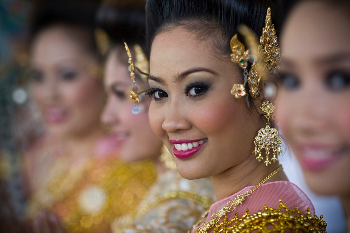 Thai greeters in traditional dress wait Friday, Dec. 5, 2008, at Suvarnabhumi airport in Bangkok, Thailand. Recent political unrest and the illegal occupation of Bangkok's two international airports which left more than 350,000 tourist stranded, is having a dramatic economic effect as high season cancellations are pouring in. (AP Photo/David Longstreath) Thai greeters in traditional dress wait Friday, Dec. 5, 2008, at Suvarnabhumi airport in Bangkok, Thailand. (AP Photo/David Longstreath)