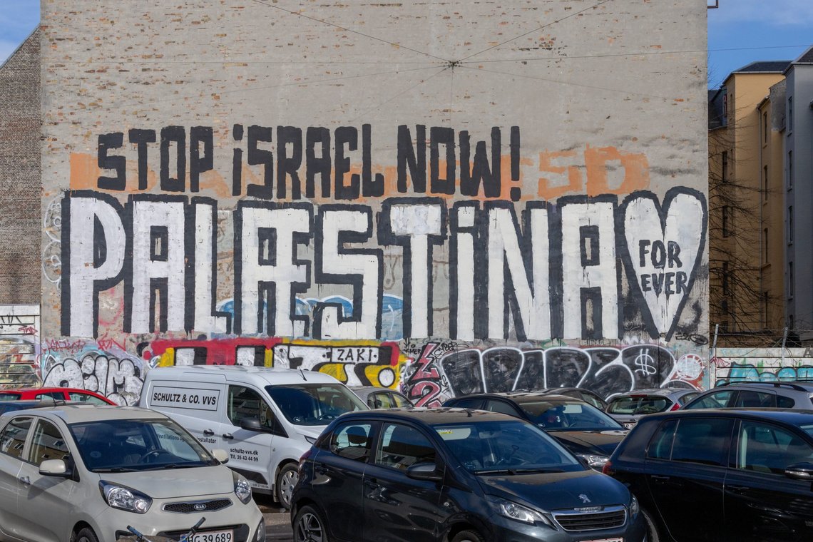 Copenhagen, Denmark Feb 22, 2023 A stop Israel sign painted on the facade of a building in the Norrebro district. Photo: Shutterstock by Alexanderstock23, Sweden. Copenhagen, Denmark Feb 22, 2023 A stop Israel sign painted on the facade of a building in the Norrebro district. Photo: Shutterstock by Alexanderstock23, Sweden.