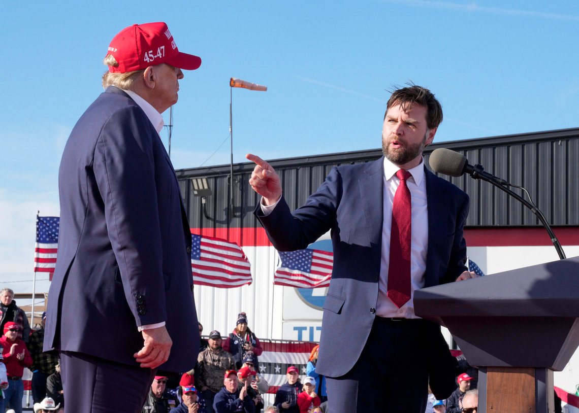 U.S. Sen. J.D. Vance, R-Ohio, right, points toward Republican presidential candidate and former President Donald Trump at a campaign rally, Saturday, March 16, 2024, in Vandalia, Ohio. (AP Photo/Jeff Dean) U.S. Sen. J.D. Vance, R-Ohio, right, points toward Republican presidential candidate and former President Donald Trump at a campaign rally, Saturday, March 16, 2024, in Vandalia, Ohio. (AP Photo/Jeff Dean)