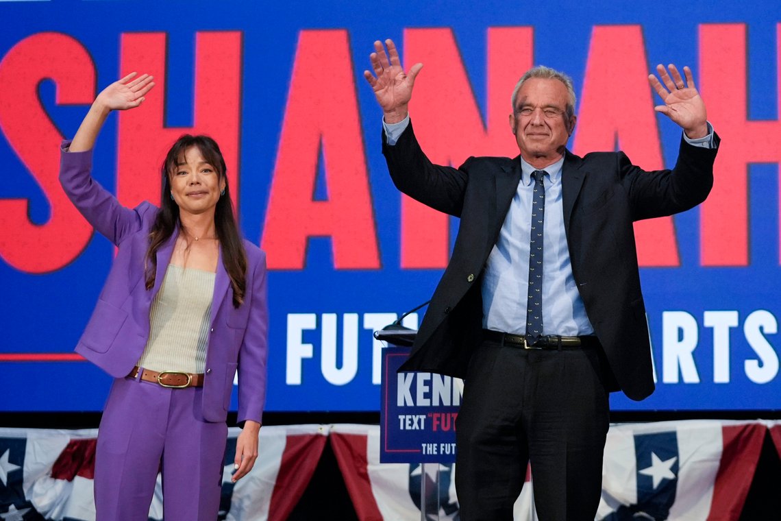 Presidential candidate Robert F. Kennedy Jr. right, waves on stage with Nicole Shanahan, after announcing her as his running mate, during a campaign event, Tuesday, March 26, 2024, in Oakland, Calif. (AP Photo/Eric Risberg) Presidential candidate Robert F. Kennedy Jr. right, waves on stage with Nicole Shanahan, after announcing her as his running mate, during a campaign event, Tuesday, March 26, 2024, in Oakland, Calif. (AP Photo/Eric Risberg)
