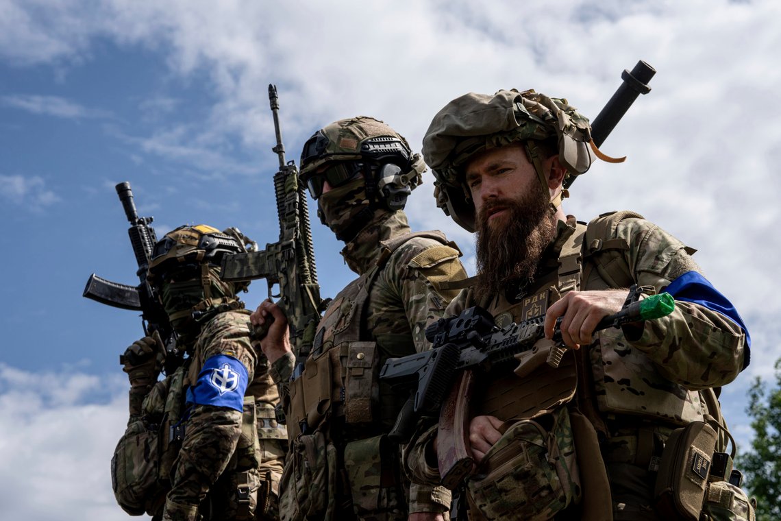 FILE - Fighters of Russian Volunteer Corps stand atop on an APC during press conference not far from the Ukraine's border with Russia in Sumy region, Ukraine, on May 24, 2023. Fighters from Ukraine made an attempt to cross into the town of Tetkino, which lies right on the border, the governor of Russia’s Kursk region, Roman Starovoit, said Tuesday. (AP Photo/Evgeniy Maloletka, File) FILE - Fighters of Russian Volunteer Corps stand atop on an APC during press conference not far from the Ukraine's border with Russia in Sumy region, Ukraine, on May 24, 2023. Fighters from Ukraine made an attempt to cross into the town of Tetkino, which lies right on the border, the governor of Russia’s Kursk region, Roman Starovoit, said Tuesday. (AP Photo/Evgeniy Maloletka, File)