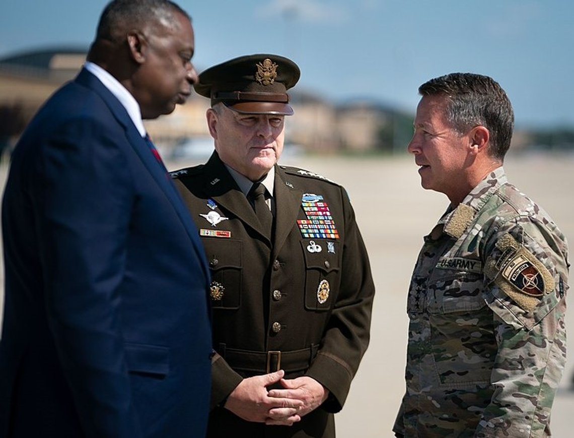 Defense Secretary Lloyd Austin and Army Gen. Mark A. Milley, chairman of the Joint Chiefs of Staff, meet Army Gen. Scott Miller at Joint Base Andrews, Md., upon his return home from Afghanistan after relinquishing command of U.S. and NATO Resolute Support Mission, July 14, 2021. Miller relinquished command July 12, 2021 as the U.S. reduces the military presence in Afghanistan. (DOD Photo by Navy Petty Officer 1st Class Carlos M. Vazquez II). Photo: Wikimedia Commons. Defense Secretary Lloyd Austin and Army Gen. Mark A. Milley, chairman of the Joint Chiefs of Staff, meet Army Gen. Scott Miller at Joint Base Andrews, Md., upon his return home from Afghanistan after relinquishing command of U.S. and NATO Resolute Support Mission, July 14, 2021. Miller relinquished command July 12, 2021 as the U.S. reduces the military presence in Afghanistan. (DOD Photo by Navy Petty Officer 1st Class Carlos M. Vazquez II). Photo: Wikimedia Commons.